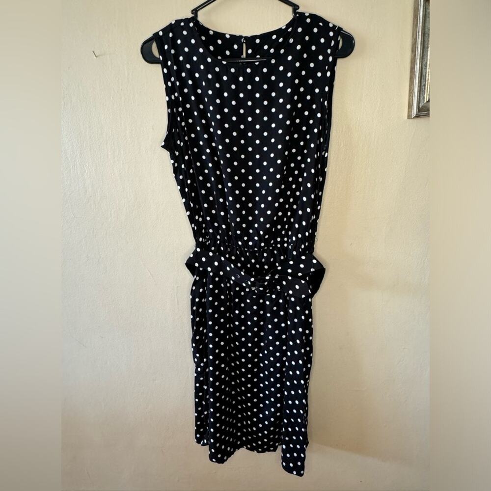 Black polka dot dress. Vintage from 90s. Size 12P and includes matching belt.